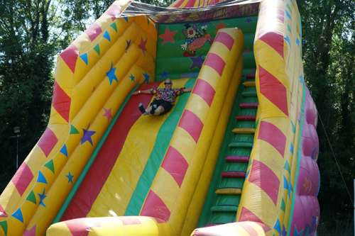 Atmos employee on bouncy castle