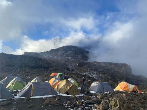 An image of tents at a campsite during Sales and Senior Research Engineer Harry Smith's ascent of Kilimanjaro