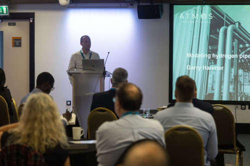 An image of Senior Simulation Consultant Garry Hanmer presenting on using real time systems to model hydrogen pipelines