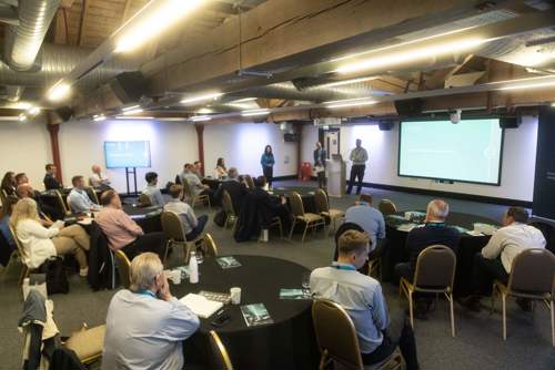 An image of Atmos SIM Product Manager Glen Tyson presenting to User Conference attendees