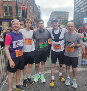A group photo of Atmos colleagues before the Great Manchester Run