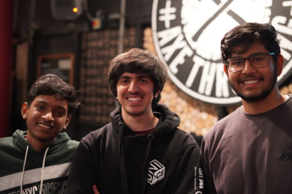 Dilan, Ali, and Madhavan, three of Atmos' interns from last year's GreatUniHack