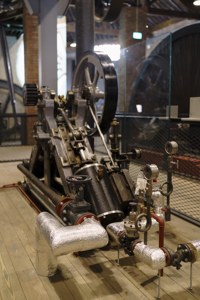 A picture of a restored diagonal steam engine at the Science and Industry Museum's Power Hall: The Andrew Law Gallery, supported by a donation from Atmos International - Science Museum Group © The Board of Trustees of the Science Museum
