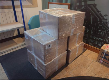 An image of multiple boxes containing Atmos Pit Sentry units ready for shipment
